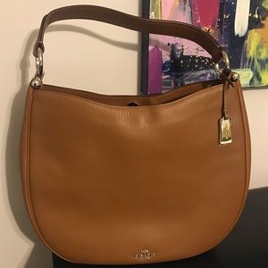 COACH brown leather half moon handbag